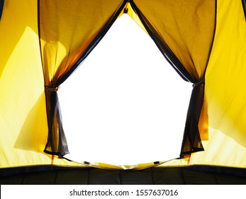 Looking through opening door of yellow tent camping isolated on white background.