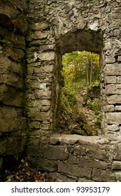 looking through a rough hewn window from turn of the century flour mill