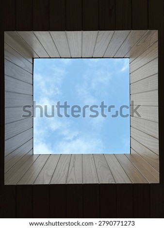 Looking up through timber lined skylight