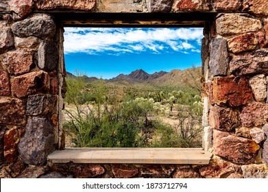 Looking Through The Window At The Picturesque Desert Landscape From The Ruins Of A Stone House On The Bowen Trail In Tucson Arizona.