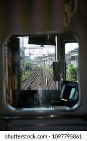 Looking through the window of train. Railway in Okasa, Japan