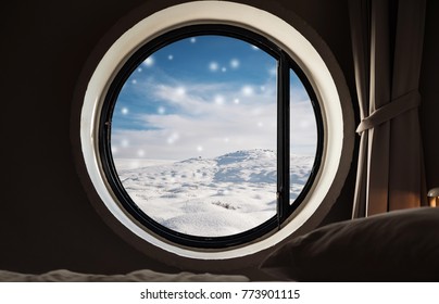 Looking through window in winter, snowdrift with snow fall in winter. Christmas morning