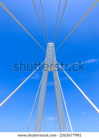 Looking to the top of suspension bridge pole structure