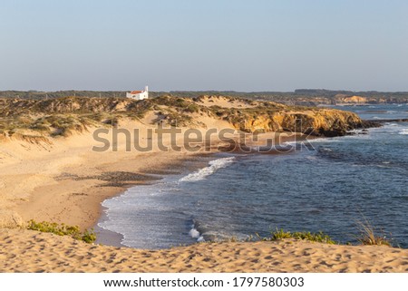Looking towards the lighthouse, through the beach, at Vila Nova Milfontes