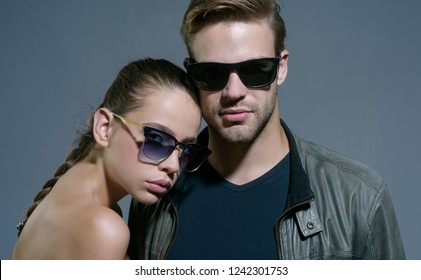 Looking Trendy. Couple In Love. Fashion Models In Trendy Sun Glasses. Couple Of Man And Woman Wear Fashion Glasses. Love Relations. Friendship Day. Friendship Relations. Young And Beautiful.