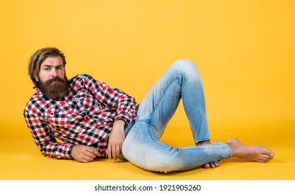 Looking Trendy. Handsome Confident Man Has Perfect Hairstyle. Happy Bearded Man In Checkered Shirt. Male Beauty Concept. Portrait Of Bearded Hipster. Guy With Long Lush Beard And Mustache On Face.