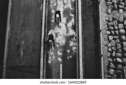 Looking at two cyclists from above
