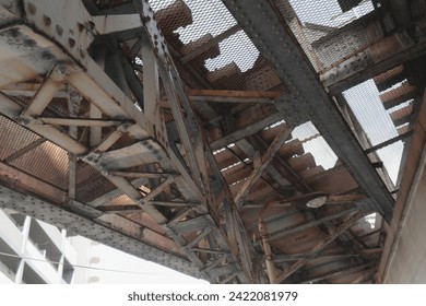 Looking up at the underside of the elevated tracks.