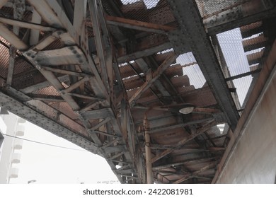 Looking up at the underside of the elevated tracks.