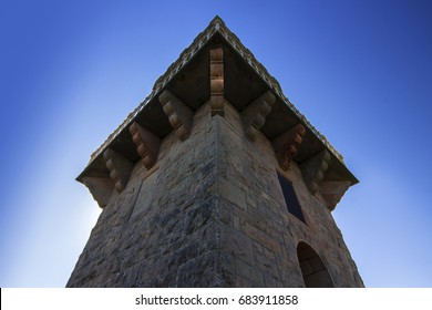 Looking upward at Centenary Tower, Mount Gambier, from below. Blue sky with space for text or banner.
