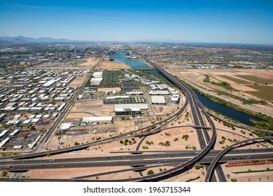 Looking West From Above The Loop 101-Loop 202 Interchange Towards The Tempe Town Lake And Downtown Phoenix, AZ In The Distance