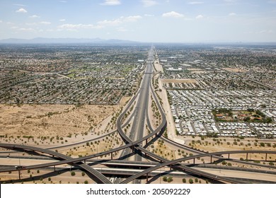 Looking West from the Loop 202 Red Mountain and U.S. 60 Superstition freeway interchange in Mesa towards Tempe and Phoenix, Arizona