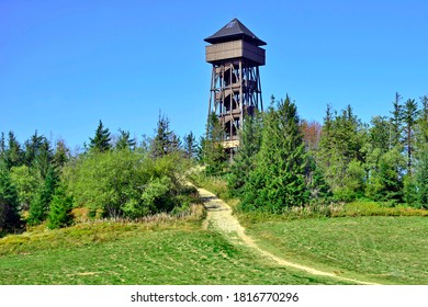 Lookout wooden tower for tourists on the top of the Luban peak in Gorce mountains, Poland