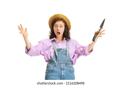 Looks Happy, Delighted. Excited Young Girl, Gardener In Work Uniform And Hat Posing Isolated On White Background. Concept Of Job, Emotions, Agronomy. Funny Meme Emotions. Copy Space For Ad