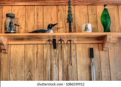 A Loon And Other Decorations On A Shelf In A Northern Minnesota Lake Cabin