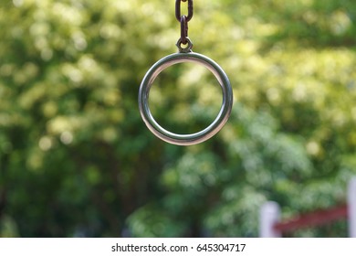 Loop Rings Metal Bar In Park With Green Bokeh Background ,Out Doors Fitness