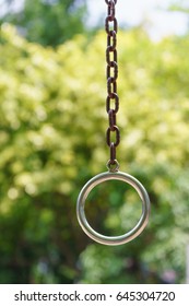 Loop Rings Metal Bar In Park With Green Bokeh Background ,Out Doors Fitness