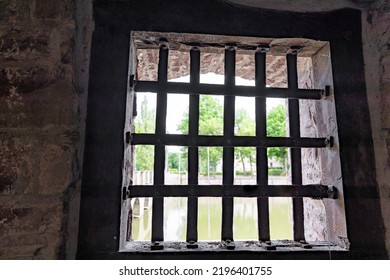 Loophole With Bars In The Fortification Wall Of A Medieval Castle, Inside View