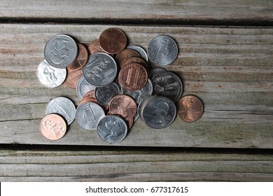 Loose Change On Wood Table