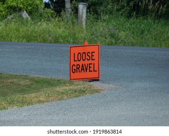A Loose Gravel Sign At An Intersection