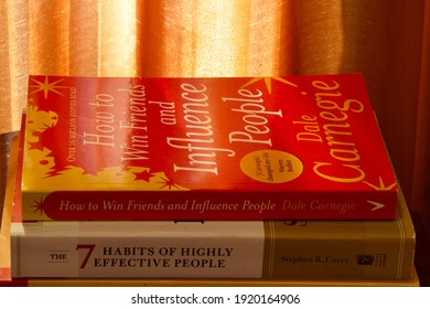 Lopburi, Thailand - Feb 19 2021: For Illustrative Editorial Use Only, “How To Win Friends And Influence People” By Dale Carnegie And 7 Habits Of Highly Effective People By Stephen R. Covey On Table.