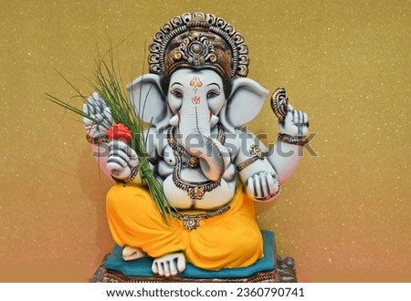 Lord Ganpati, Ganesha Idol on Golden Background, Happy Ganesh Chaturthi.Ganpati with Beautiful background,Ganpati Bappa Morya
