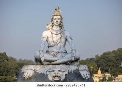 Lord Shiva, Handmade statue of lord shiv with plain background near river ganges ghat in rishikesh. - Shutterstock ID 2282425761