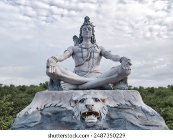 Lord Shiva statue on the banks of the sacred Ganges River in Haridwar, India. - Powered by Shutterstock