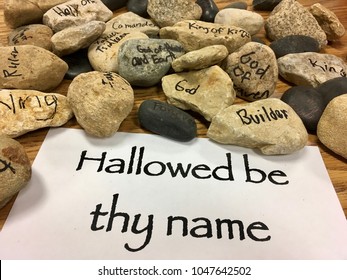 Lord's Prayer Rocks Hallowed be God's Name - Shutterstock ID 1047642502