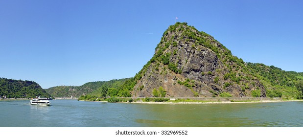 Loreley Rock at the Rhine River in Germany - Panorama Photo with the City St. Goar in the background, region Rhineland-Palatinate, Central Europe