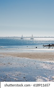     Lorient, Larmor Plage, Beach, Low Tide With Sailing Boats In Sunlight 