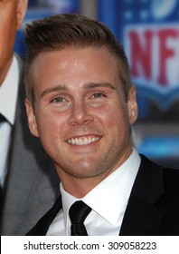 LOS ANGELES - APR 7:  Aaron Hill Arrives At The DRAFT DAY LOS ANGELES PREMIERE   On April 7, 2014 In Westwood, CA                