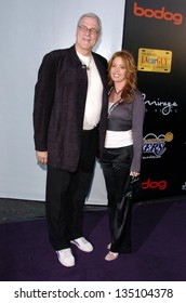 LOS ANGELES - APRIL 12: Phil Jackson And Jeanie Buss At The 3rd Annual Bodog Celebrity Poker Invitational At Barker Hangar On April 12, 2006 In Santa Monica, CA.