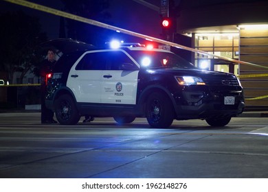 Los Angeles - April 24, 2021: 
LAPD Police Car Blocks Sunset Blvd. Following A Fatal Officer Involved Shooting Night Exterior