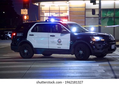 Los Angeles - April 24, 2021: 
Los Angeles Police car blocks traffic on Sunset Blvd. after officer involved shooting