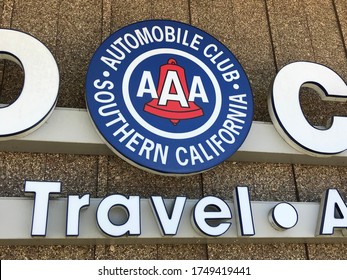 LOS ANGELES, April 6th, 2019: AAA Auto Club Southern California Travel Close Up Of Logo And Sign Attached To The Facade At The Auto Club's Branch Office Building In Culver City, California.