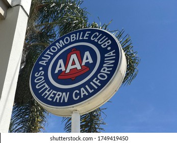 LOS ANGELES, April 6th, 2019: AAA Auto Club Southern California Exterior Logo And Sign Close Up Against Palms And A Blue Sky, At The Auto Club's Branch Office In Culver City, California.