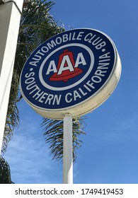 LOS ANGELES, April 6th, 2019: AAA Auto Club Southern California Exterior Logo And Sign Close Up Against Palms And A Blue Sky, At The Auto Club's Branch Office In Culver City, California.