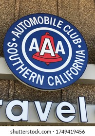 LOS ANGELES, April 6th, 2019: AAA Auto Club Southern California Close Up Of Logo And Sign Attached To The Facade At The Auto Club's Branch Office Building In Culver City, California.