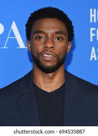 LOS ANGELES - AUG 02:  Chadwick Boseman arrives for the HFPA's Grants Banquet on August 2, 2017 in Beverly Hills, CA                