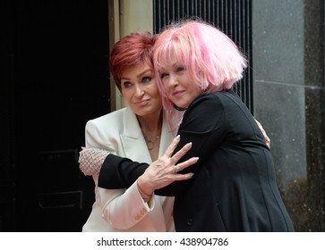 LOS ANGELES, CA. April 11, 2016: Cyndi Lauper & Sharon Osbourne at Lauper's star ceremony on Hollywood Walk of Fame.

