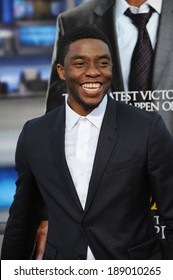 LOS ANGELES, CA - APRIL 7, 2014: Chadwick Boseman at the Los Angeles premiere of his movie "Draft Day" at the Regency Village Theatre, Westwood. 