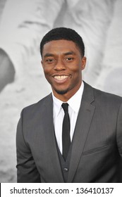 LOS ANGELES, CA - APRIL 9, 2013: Chadwick Boseman at the Los Angeles premiere of his new movie "42: The True Story of An American Legend" at the Chinese Theatre, Hollywood. Picture: Jaguar