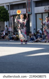 Los Angeles, CA - August 14 2022:  Dancers In Traditional Japanese Clothing Dance In The Nisei Festival In Little Tokyo