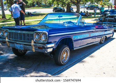 Los Angeles, CA - CIRCA 2019: Vintage Restored Chevy Chevrolet Impala Classic American Lowrider Car With Custom Paint, Wire Rims And Hydraulics