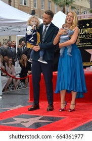 LOS ANGELES, CA - DECEMBER 15, 2016: Actor Ryan Reynolds & wife actress Blake Lively & daughters James Reynolds (2) & baby at the Hollywood Walk of Fame Star Ceremony honoring Ryan Reynolds.
