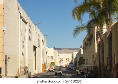 Los Angeles, CA - December 29: Paramount Pictures Backlot Alley With Hollywood Sign In Distance On December 28, 2015 In Los Angeles. Paramount Pictures In The Oldest Film Studio In Los Angeles.