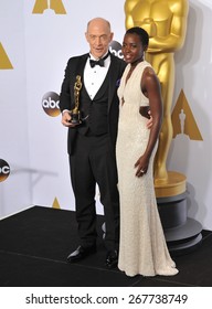 LOS ANGELES, CA - FEBRUARY 22, 2015: Lupita Nyongo & J.K. Simmons At The 87th Annual Academy Awards At The Dolby Theatre, Hollywood. 