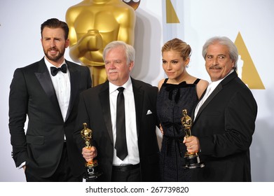 LOS ANGELES, CA - FEBRUARY 22, 2015: Chris Evans & Alan Robert Murray & Bub Asman & Sienna Miller At The 87th Annual Academy Awards At The Dolby Theatre, Hollywood. 