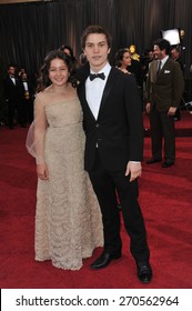 LOS ANGELES, CA - FEBRUARY 26, 2012: Nick Krause & Amara Miller At The 84th Annual Academy Awards At The Hollywood & Highland Theatre, Hollywood. 